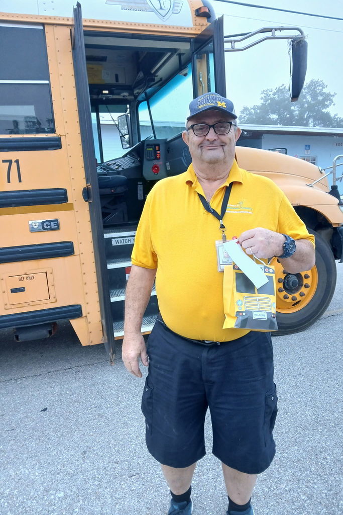 AES Bus driver with goodie bag for Bus Driver Appreciation day 2026.