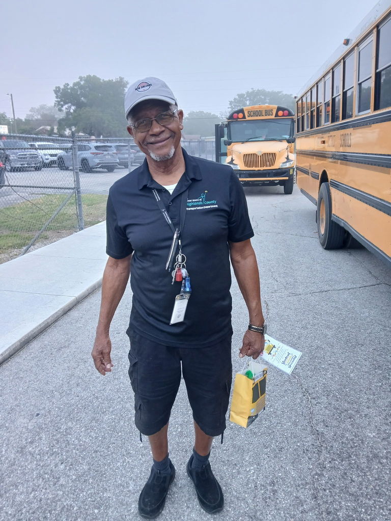 AES Bus driver with goodie bag for Bus Driver Appreciation day 2026.