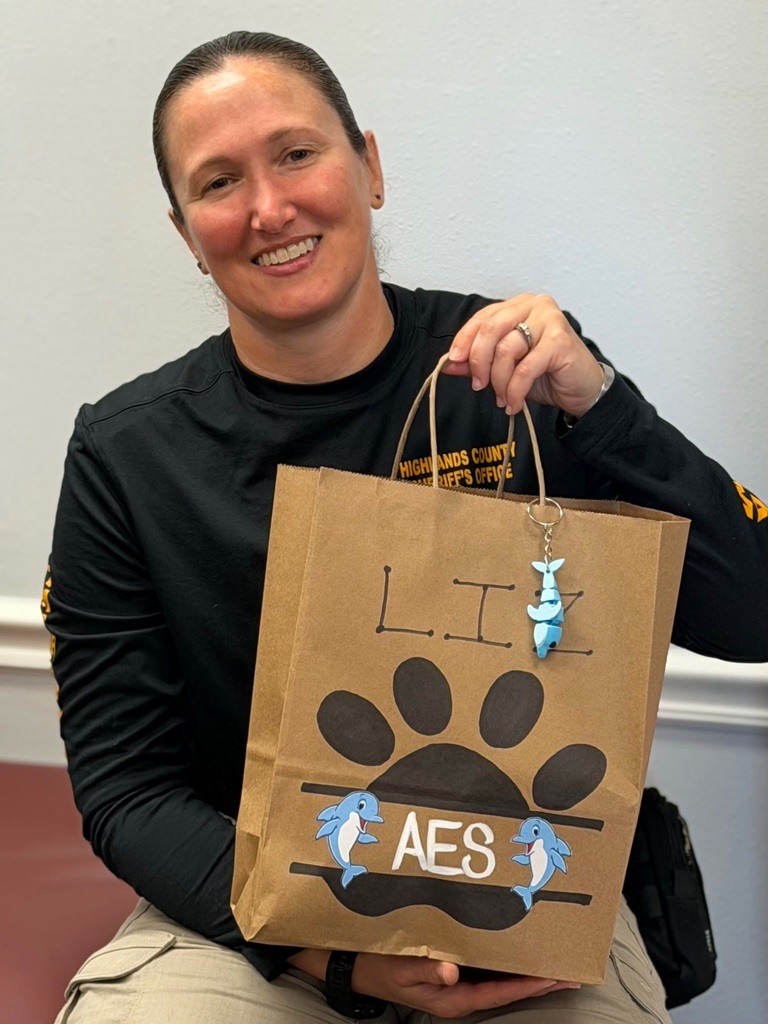 Our Therapy dogs and handlers getting showered with gifts for National Therapy Dog day. Dog or person in picture. 
