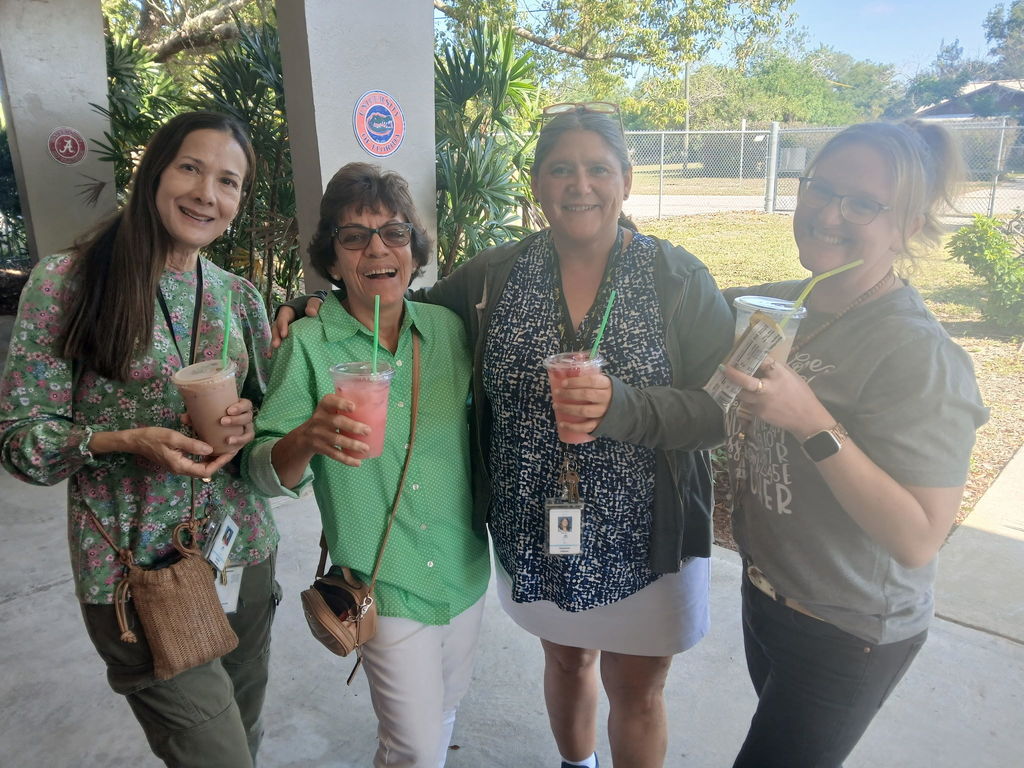 AES Staff with their treat from the Brew Crew truck. 