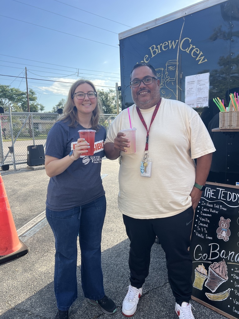 AES Staff with their treat from the Brew Crew truck. 