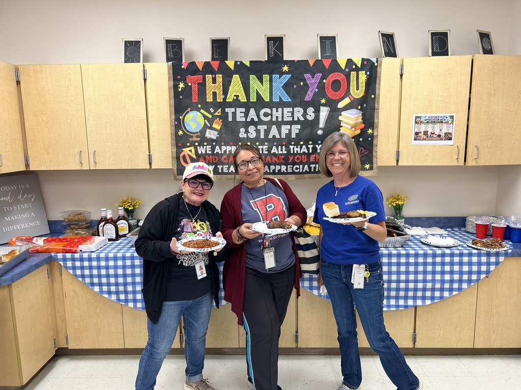 MES Staff getting their plates of BBQ for staff apprecitation week.