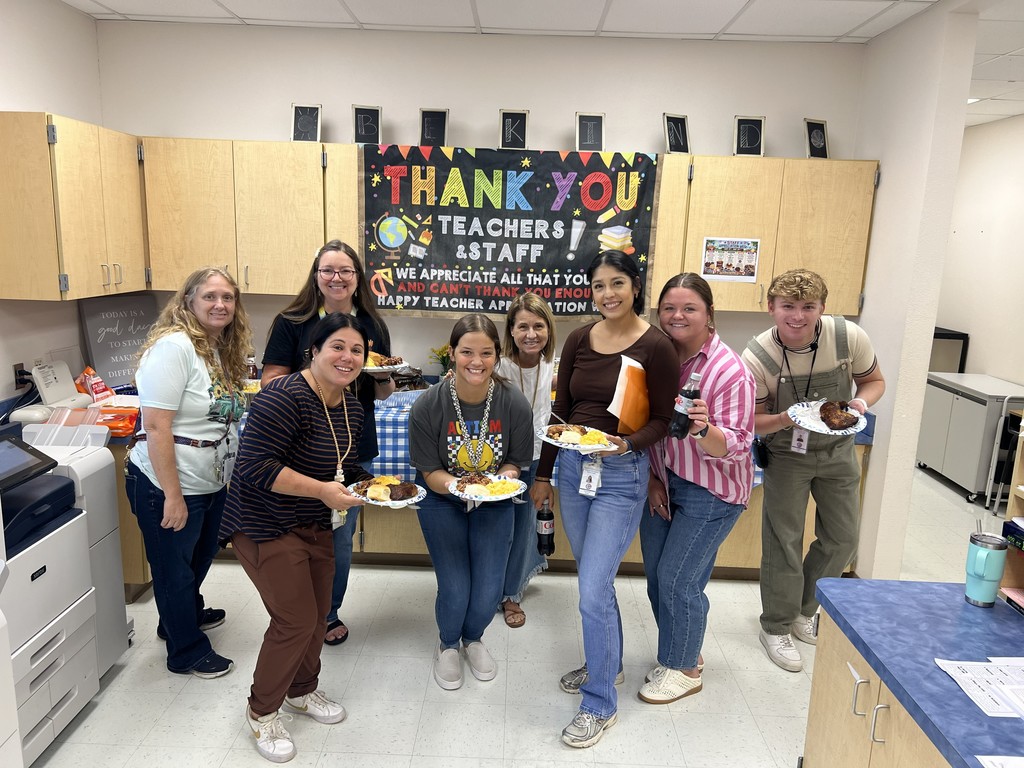 MES Staff getting their plates of BBQ for staff apprecitation week.