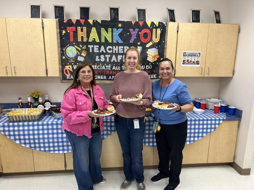 MES Staff getting their plates of BBQ for staff apprecitation week.