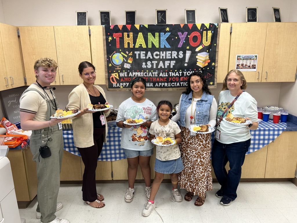 MES Staff getting their plates of BBQ for staff apprecitation week.