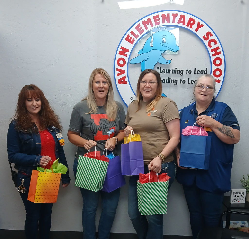 Avon Park Walmart staff and AES staff getting gift bags for staff appreciation week.