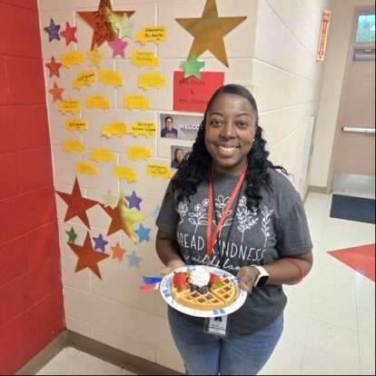 MES staff with their delicious waffle. 