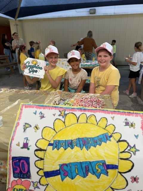 Mrs. Jones’ 3rd grade class recently finished reading The Lemonade War and brought the story to life by creating their very own lemonade stands! Students worked hard designing creative displays, developing presentations, and serving up delicious lemonade for staff and visitors to enjoy.