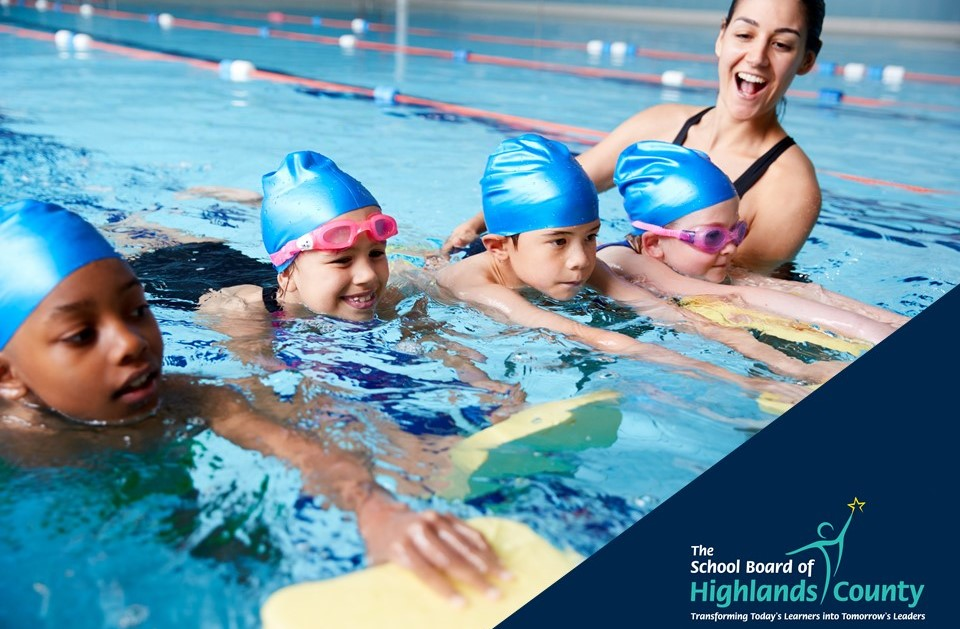 Stock photo of children learning to swim