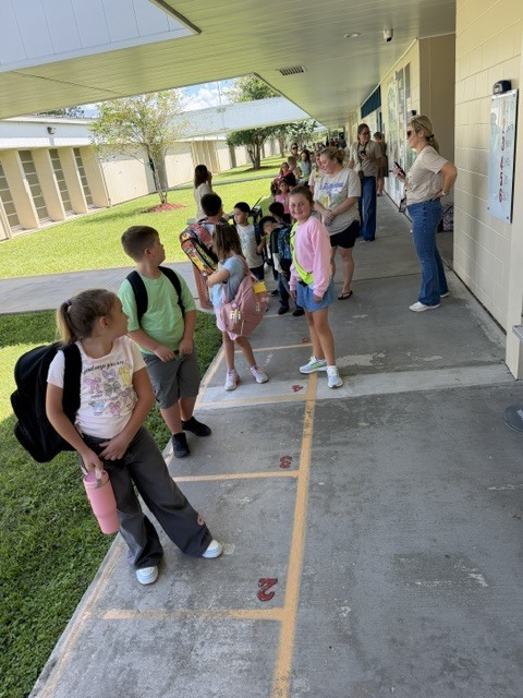 Students lined up for parent pickup.