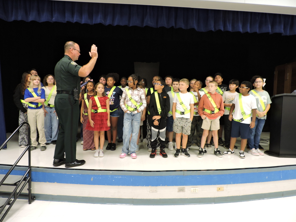 Sherrif Blackman swearing in the 2026-2027 Safety Patrol students at Fred Wild Elementary