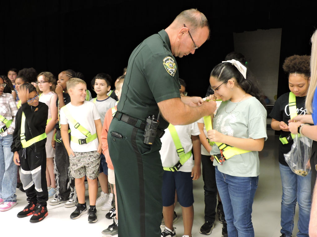 Sheriff Paul Blackman pins the Safety Patrol Captain at the pinning ceremony