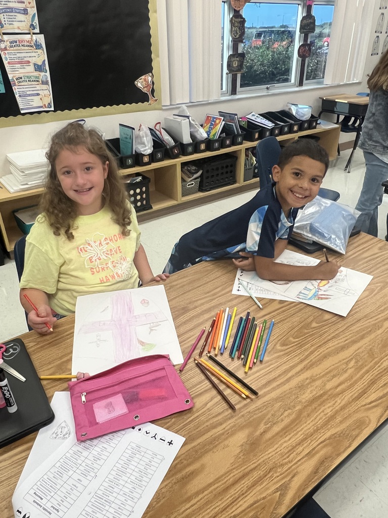 4th grade created a Coat of Arms in shields to celebrate the end of Unit 2 Empires of the Middle Ages.