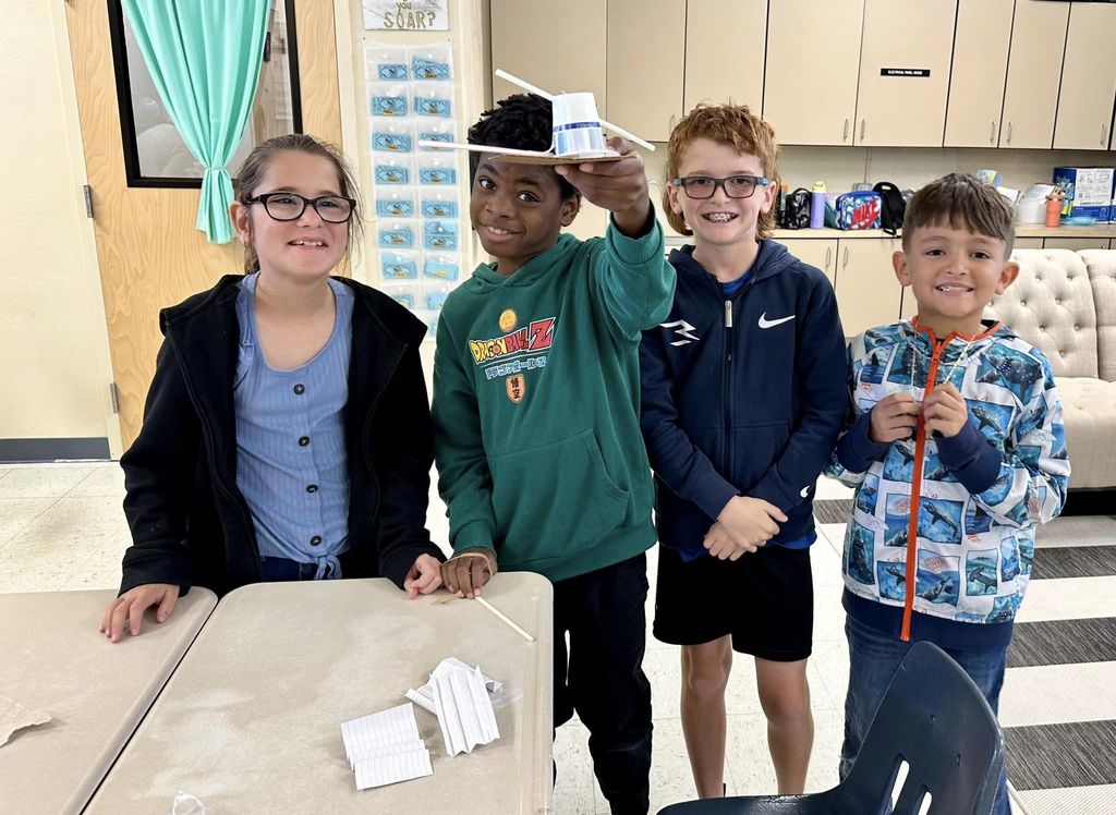 Students completing in a STEM challenge