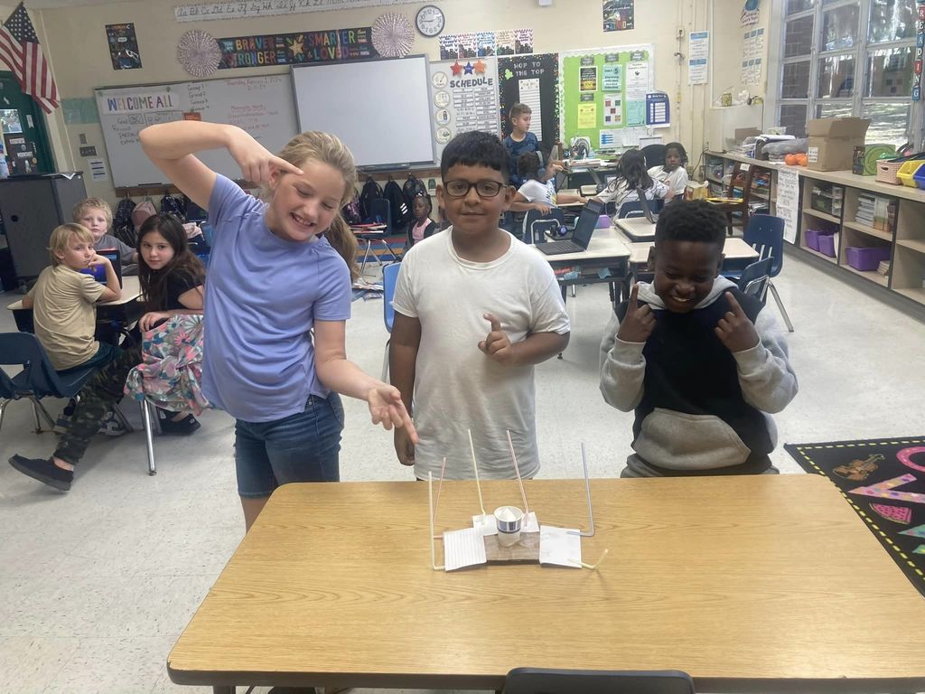 Students completing in a STEM challenge