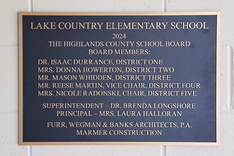 Plaque dedicating wing