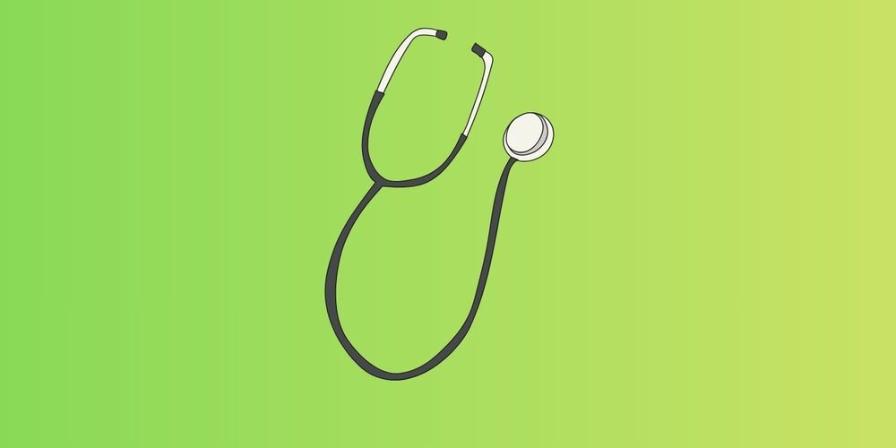 Stethoscope in front of green background