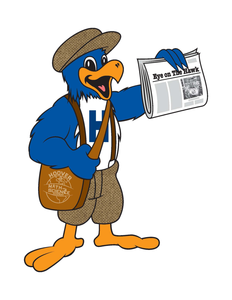 Herbie holding a newspaper