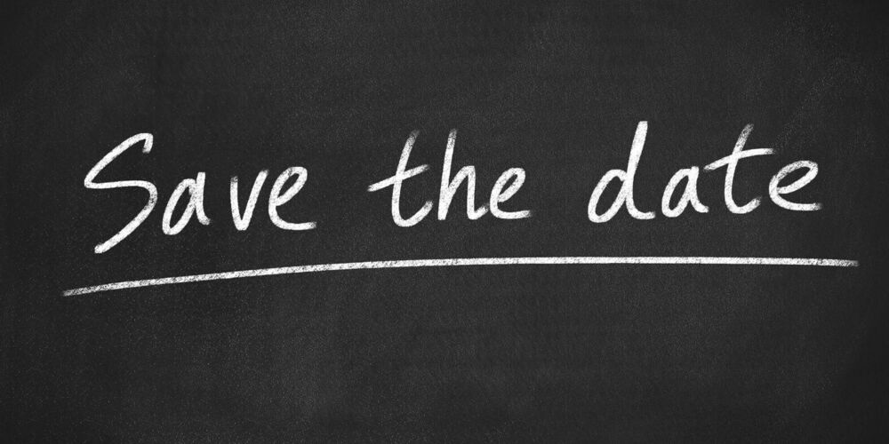 Save the date written on a chalkboard