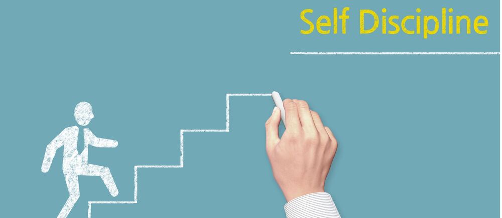 person climbing stairs to the worlds self discipline