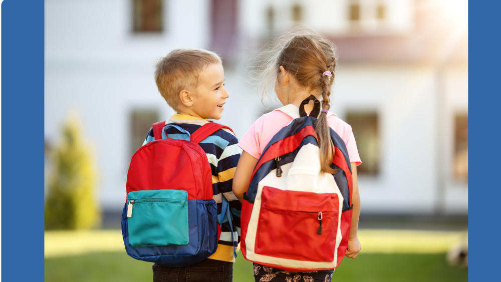 Two Kids with backpacks walking