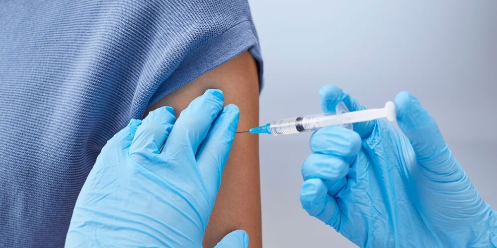 Person receiving a shot