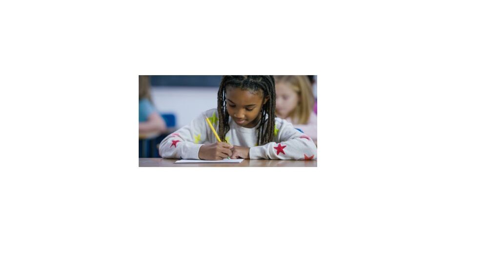 a girl working at a desk