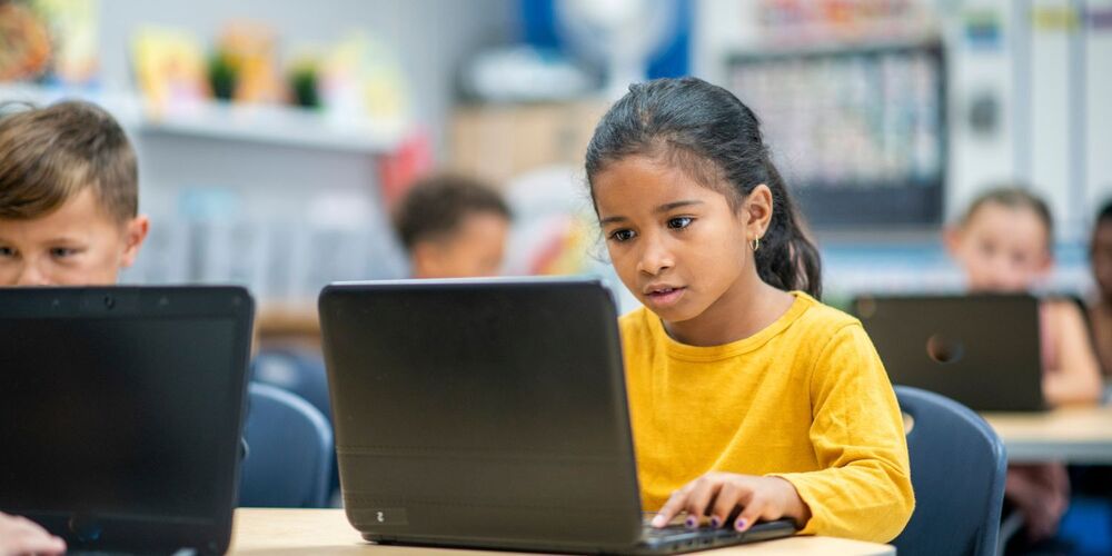 Students on laptop computers