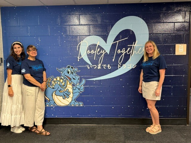 3 Kinder teachers smiling