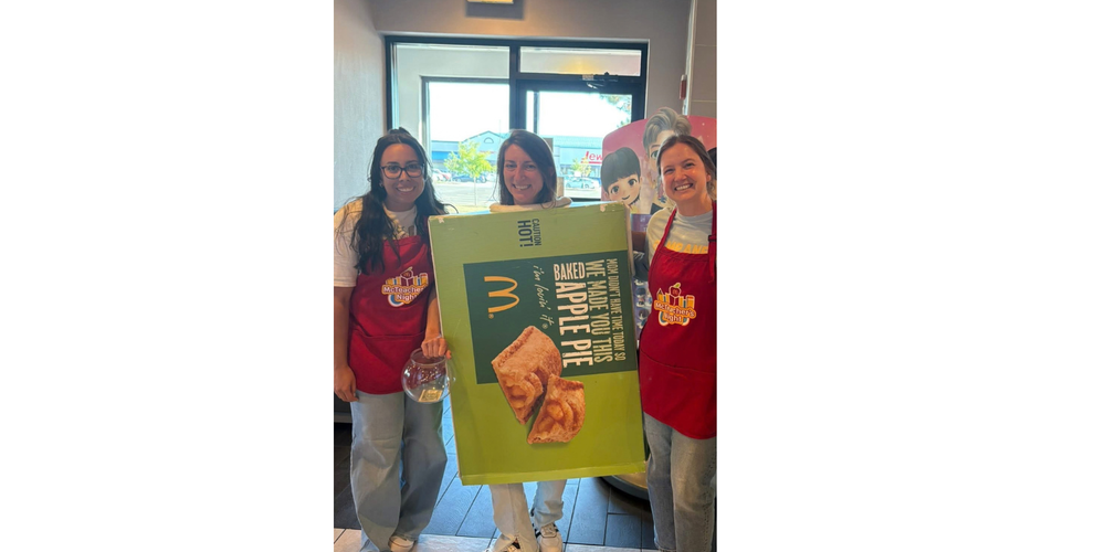 photo of Ms. Hernandez, Mrs. Imboden in an apple pie costume, and Ms. Bullington