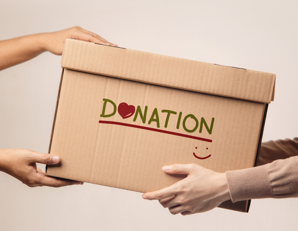 brown box with word donation on it