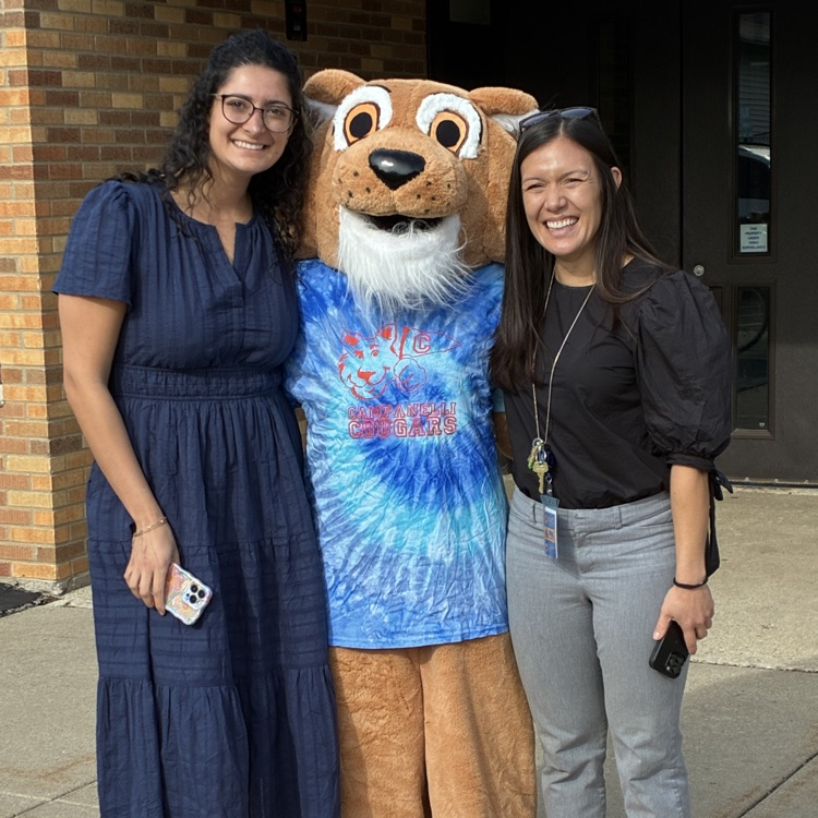 Dr. Houlihan and Ms. Moradi standing with Cody