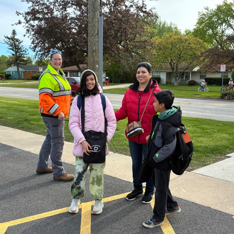 students getting a pencil for biking to school 