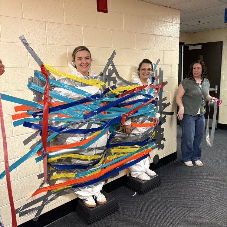 principals are taped to the wall
