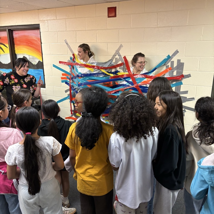 principals are taped to the wall