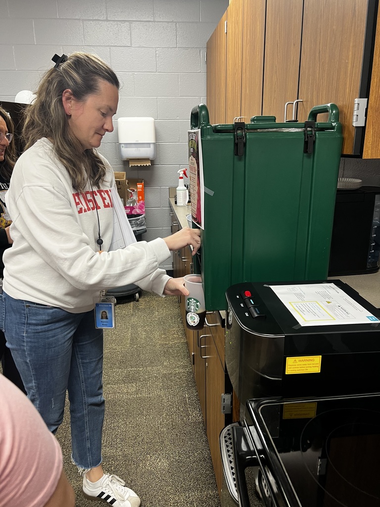 Teacher getting coffee 