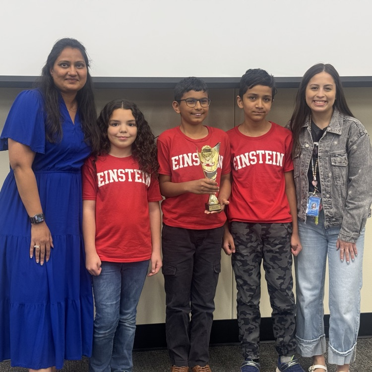 6th Grade Battle of the Books Champions with their trophy