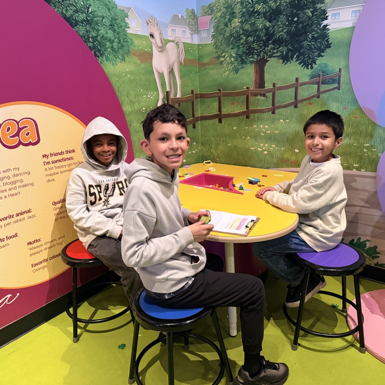 Fourth graders sitting on chairs at LEGOLAND