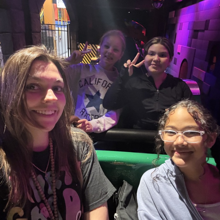 Miss Turocy and students on a ride at LEGOLAND