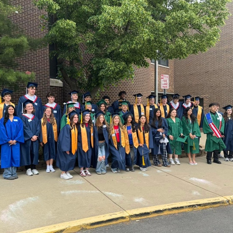 high school graduates from 2025 in front of Stevenson school