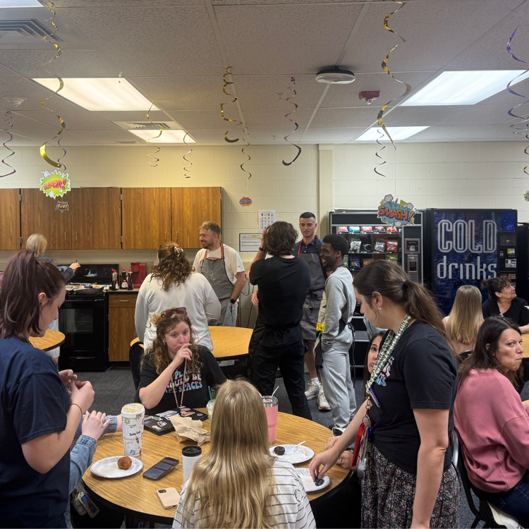 staff members enjoying breakfast