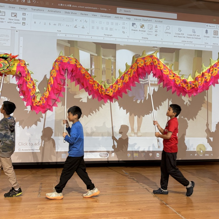 students participating in a Chinese dance