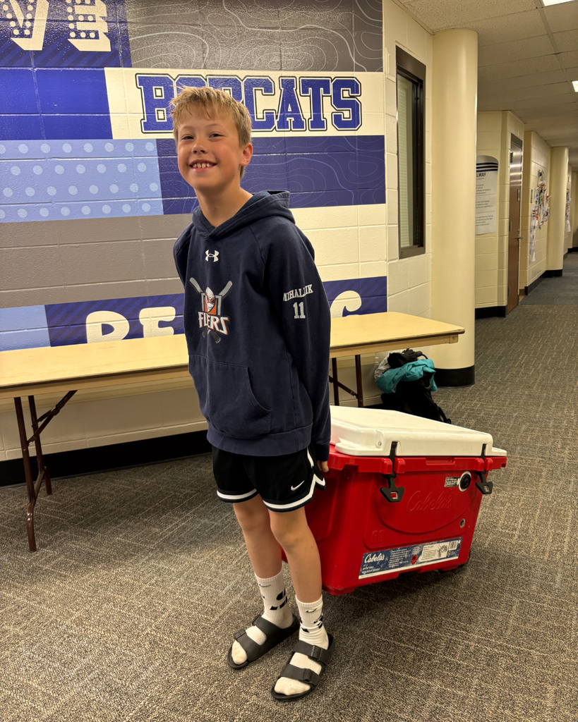 Student pulling cooler