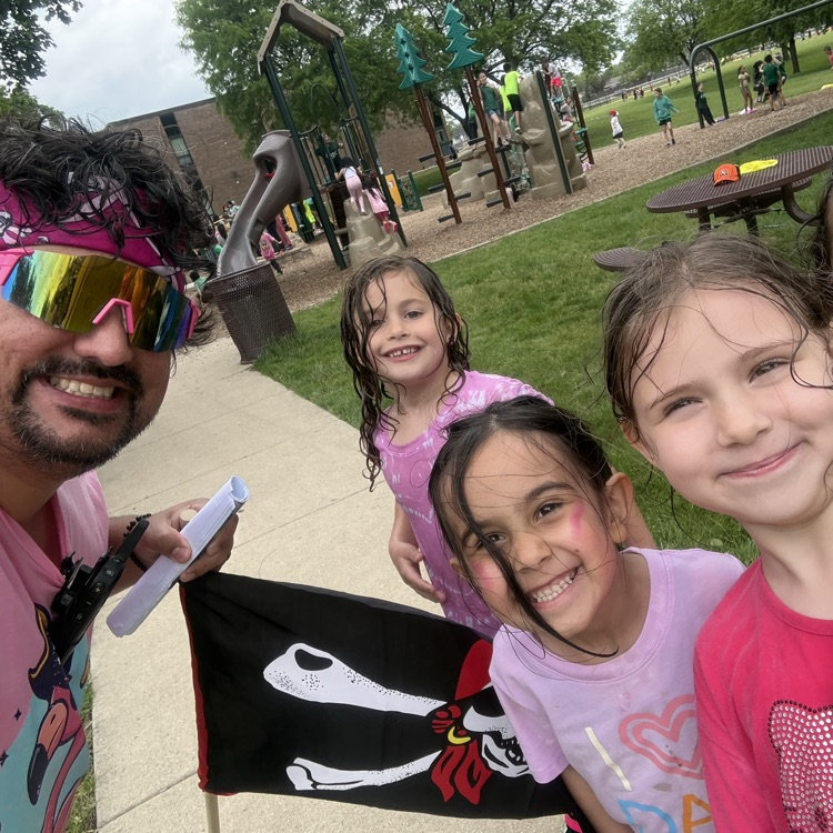 a teacher and students at field day