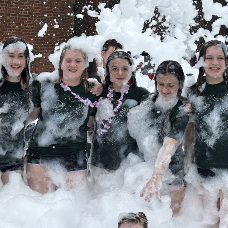 Students covered in foam.