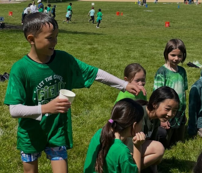Students wet during water game