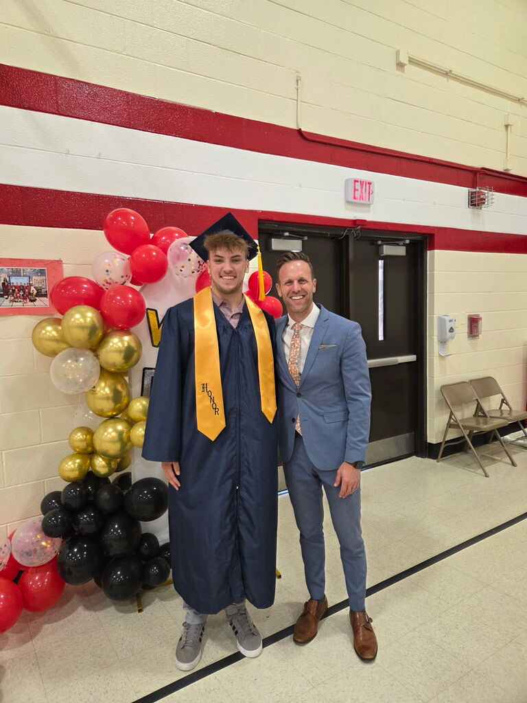 Senior with principal Quinn Wulbecker
