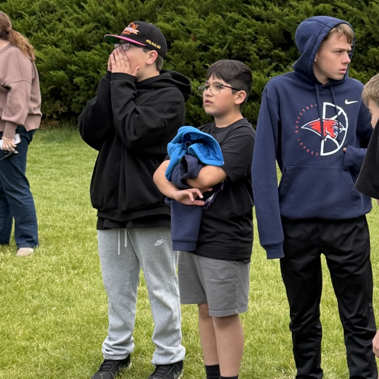6th grade students watching the game 