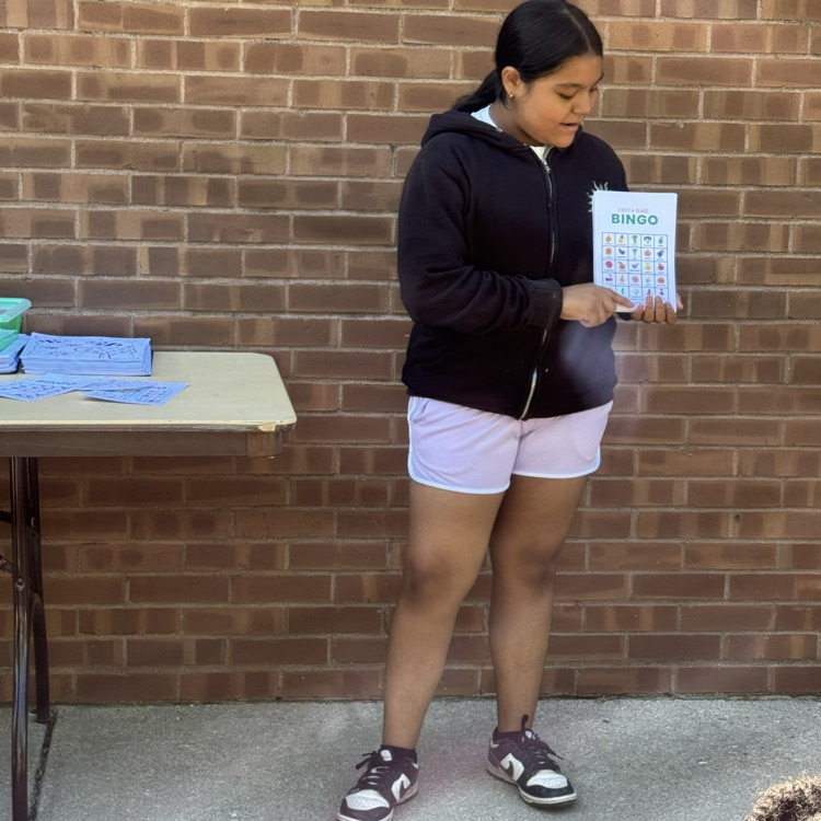 student explaining bingo