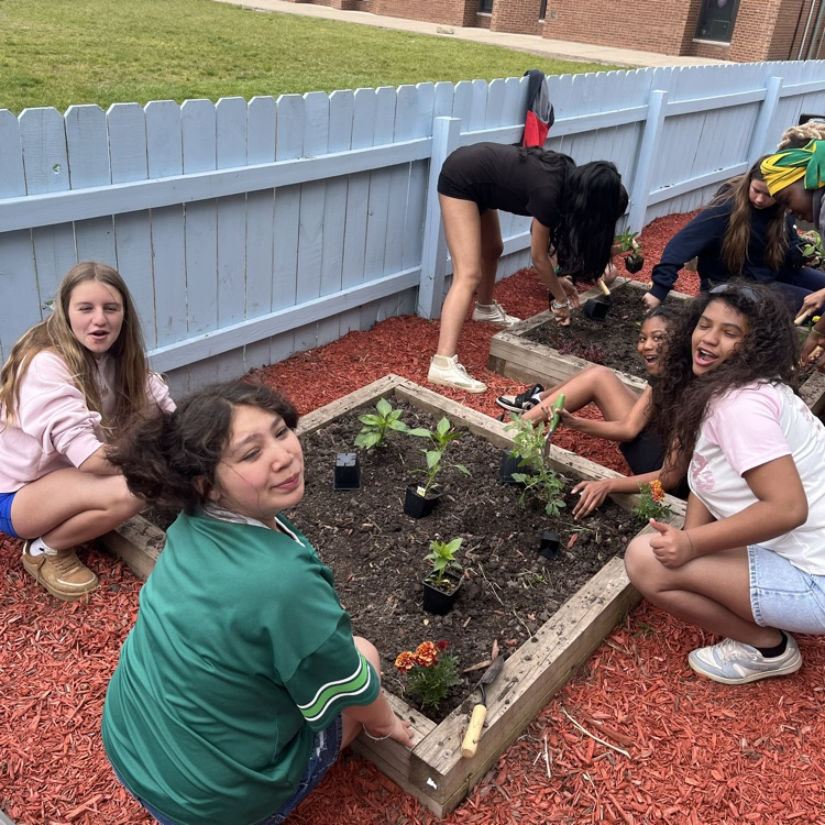 5 students planting